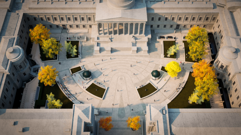 Aerial view of a landscaped courtyard with trees in autumn colours and a central fountain.